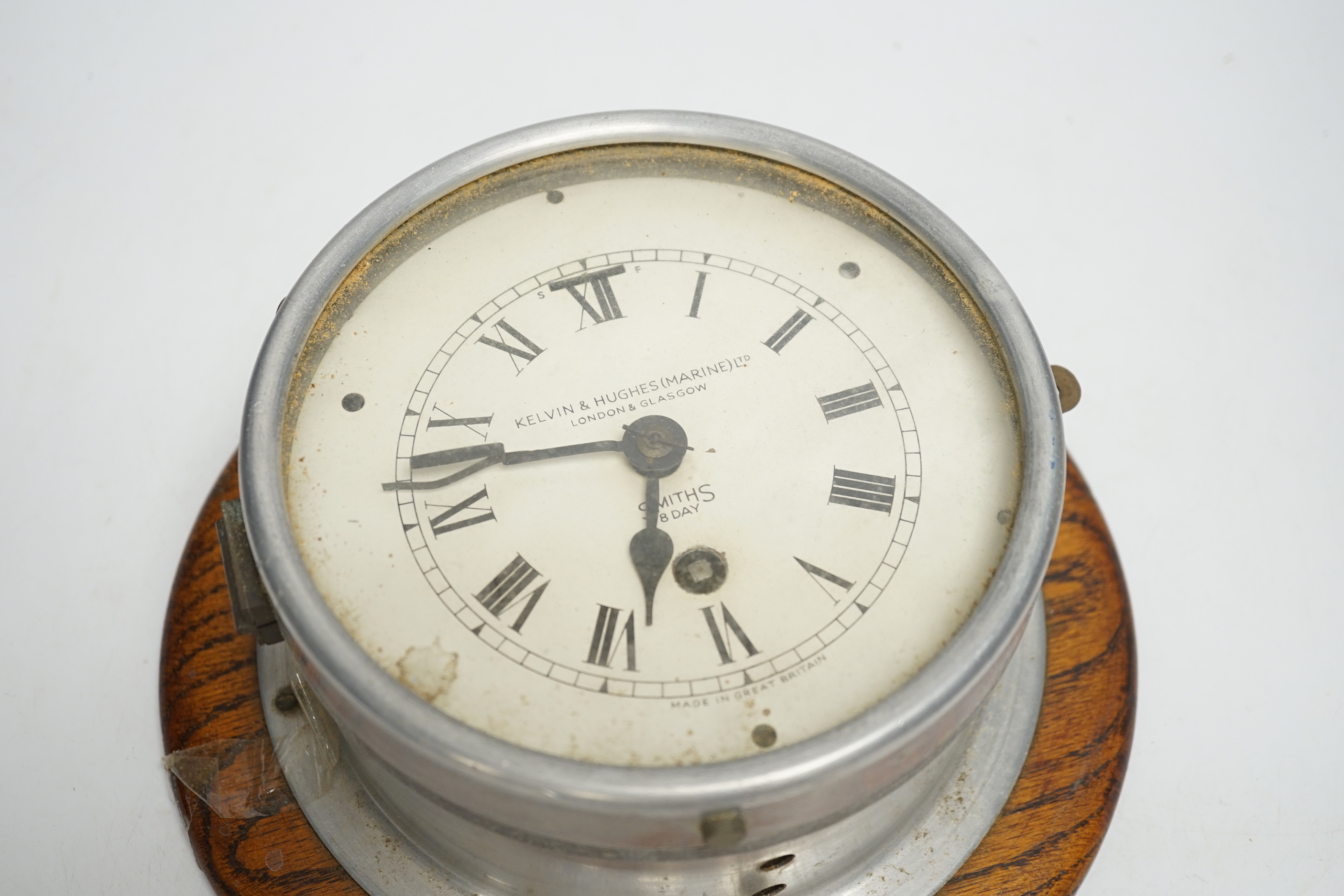 A Kevin & Hughes (Marine) Ltd ship's clock by Smiths